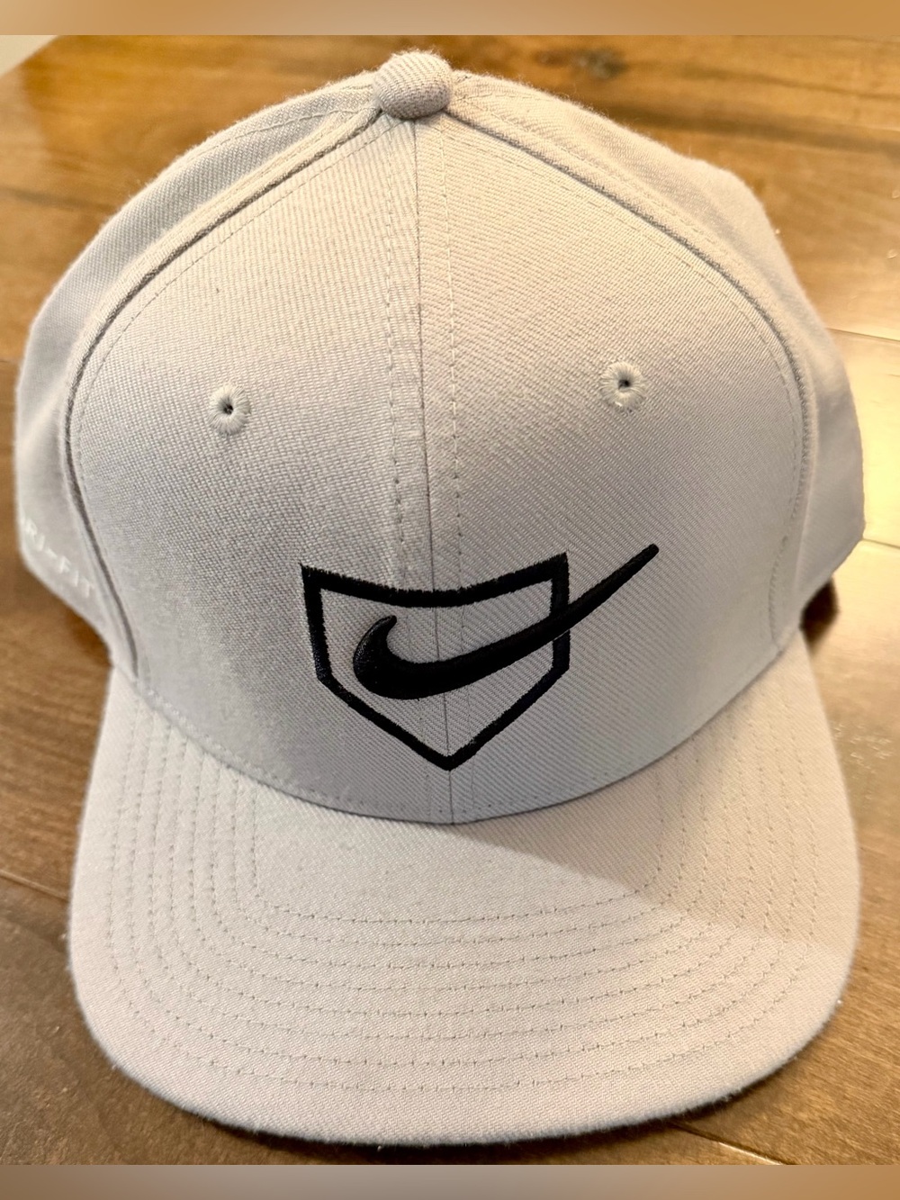 Nike Light Gray Baseball Cap with Black Swoosh Shield